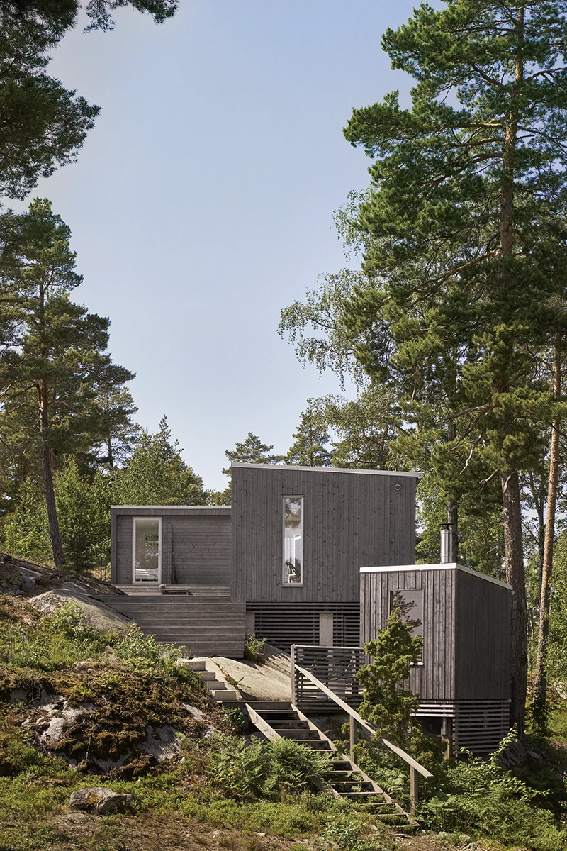 modulhus sommarbild med gra fasad